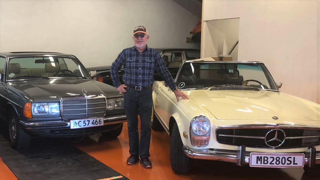 man with classic cars